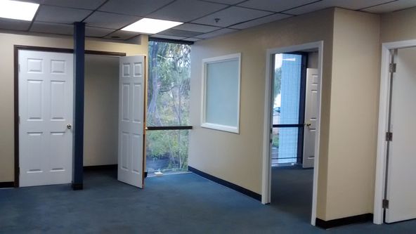 RECEPTION, TWO PRIVATE OFFICES AND OPEN SPACE. NICE LAYOUT. CORNER SUITE.